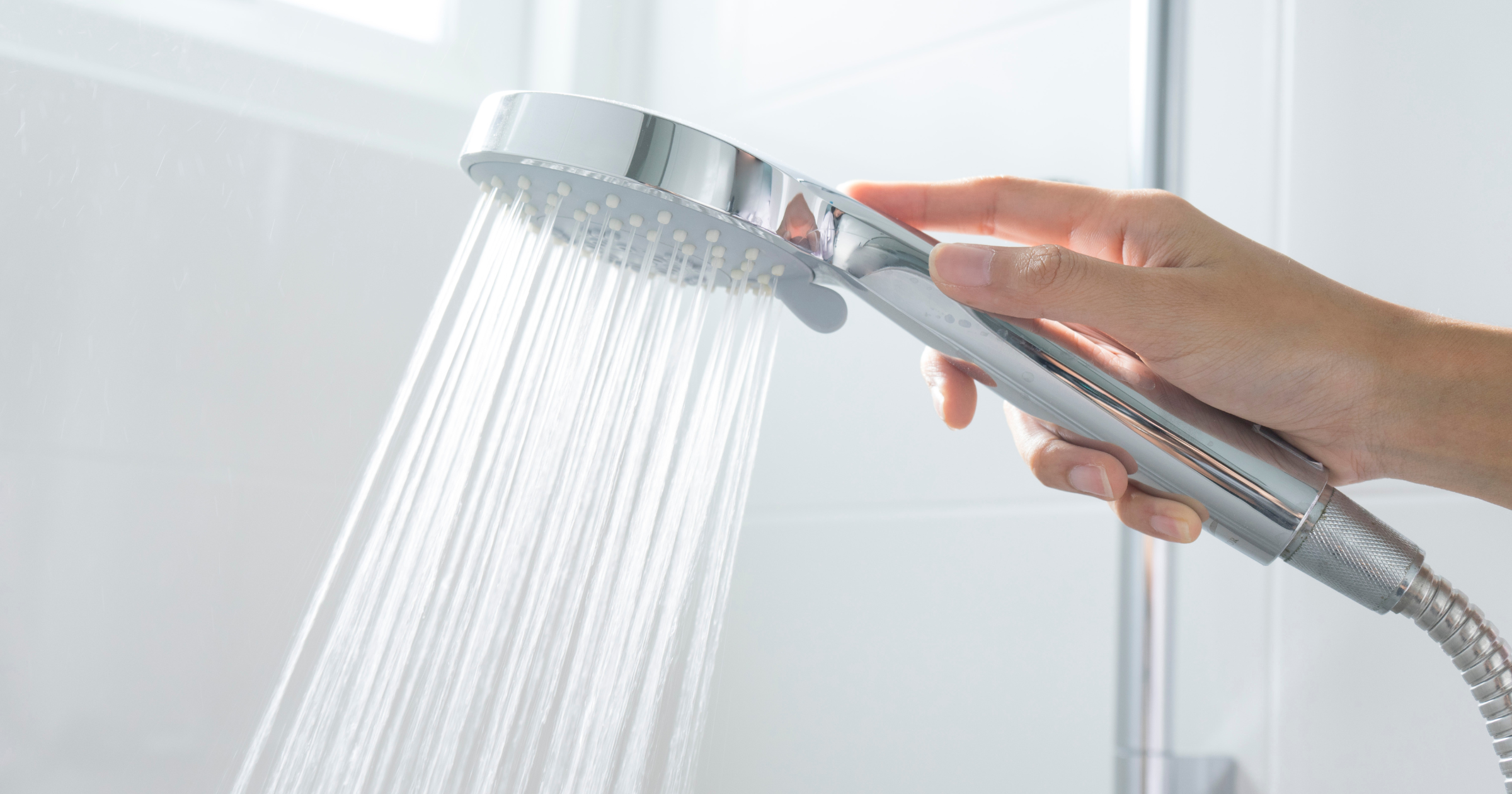 A stock image of a shower head  - start your property search on Share to Buy! 