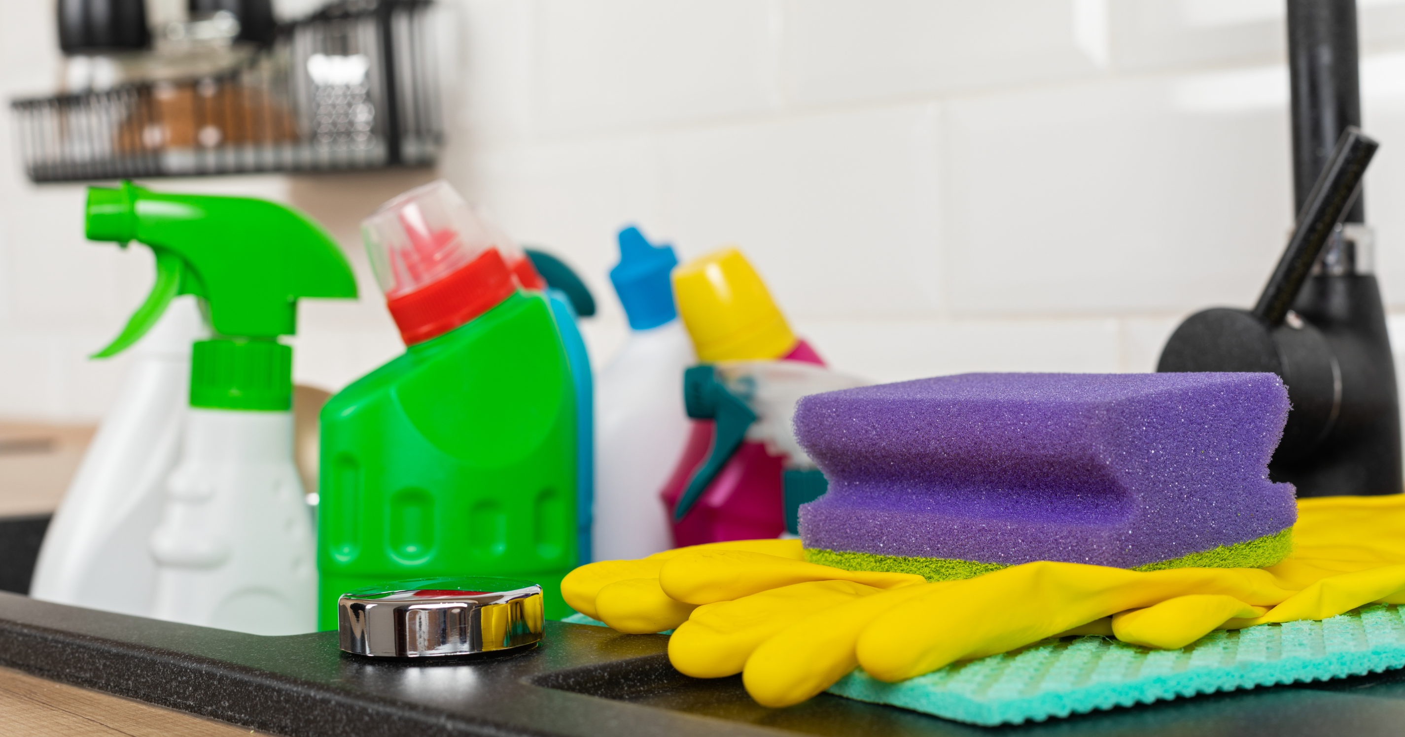 A stock image of a selection of cleaning products- start your property search on Share to Buy!