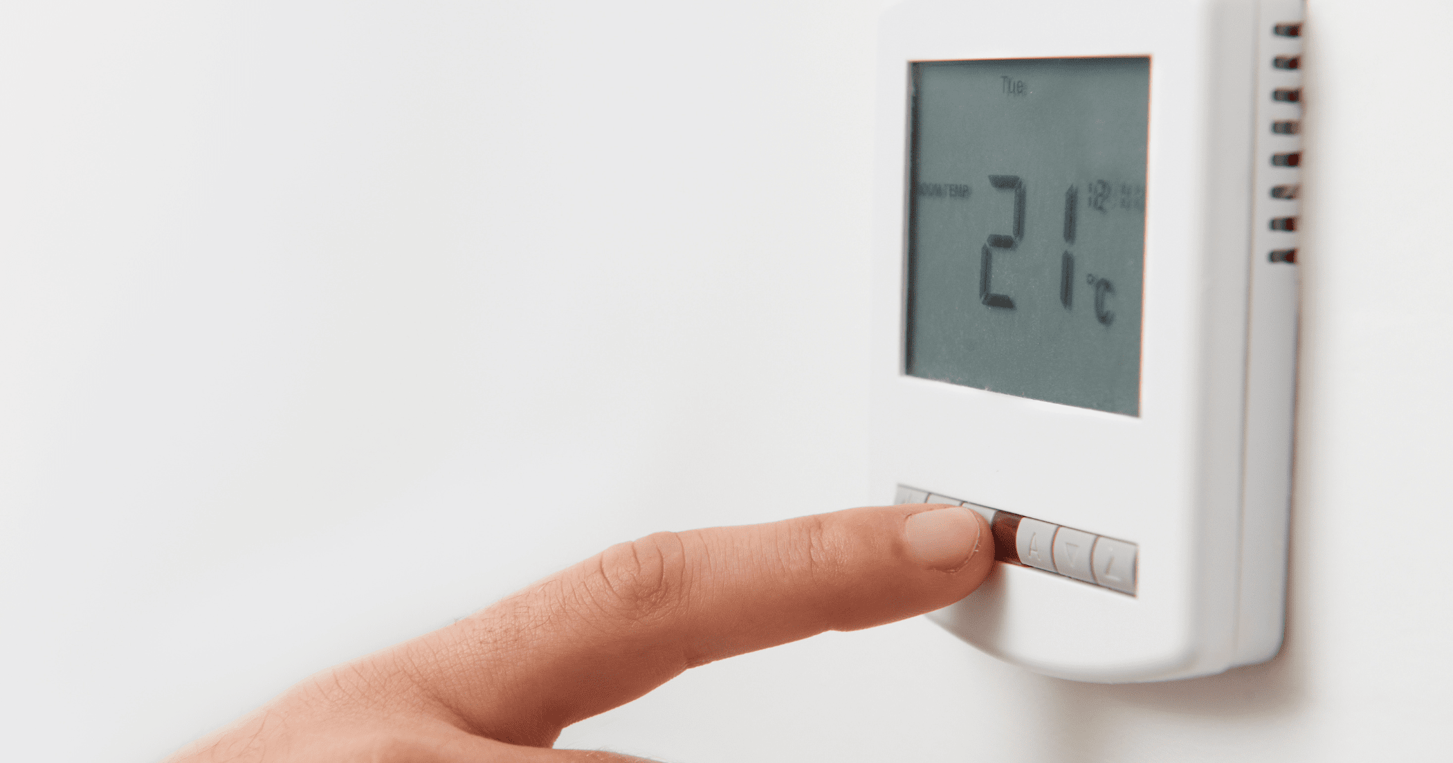 A stock image of a thermostat - start your property search on Share to Buy!