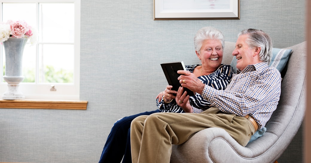 Stock image of a happy elderly couple - Start your property journey on Share to Buy!