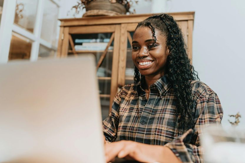 Young woman on laptop at home