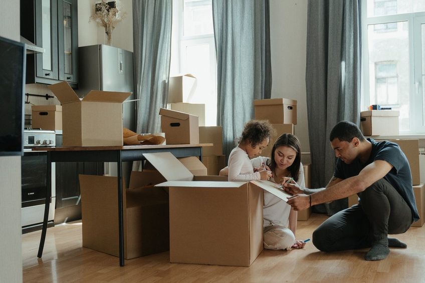 Young family moving into a new home