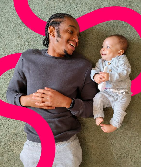 Man and baby lying on the floor