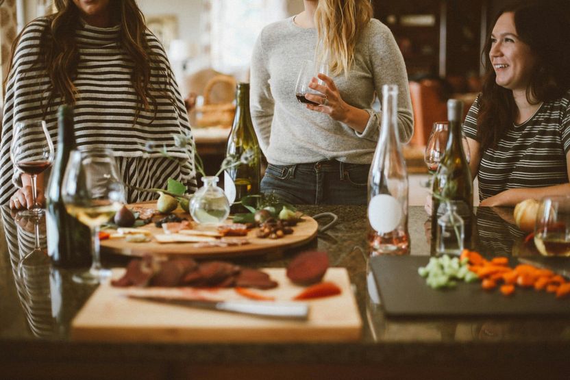 Stock image of people at a dinner party