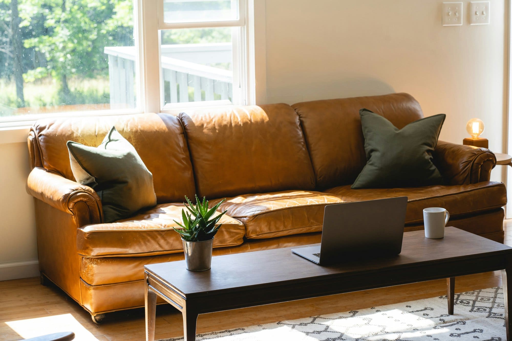 Orange living room sofa, airy lounge