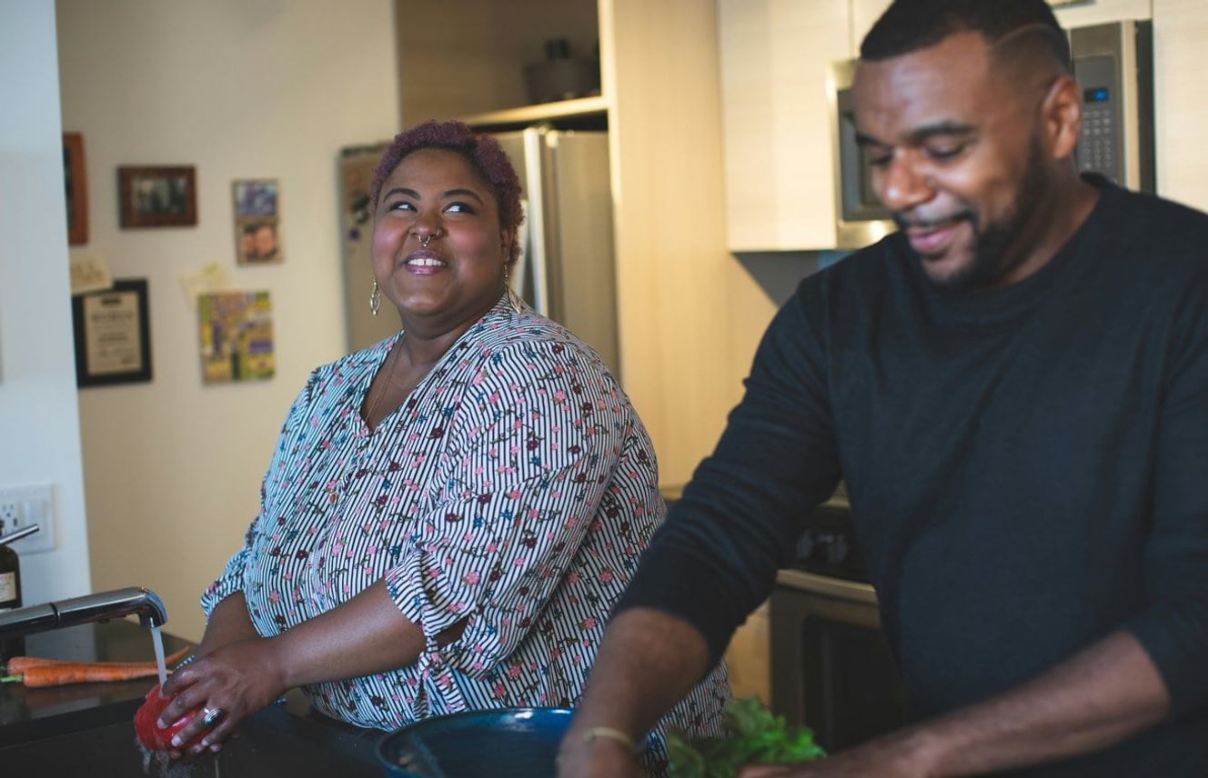 Couple cooking together at home