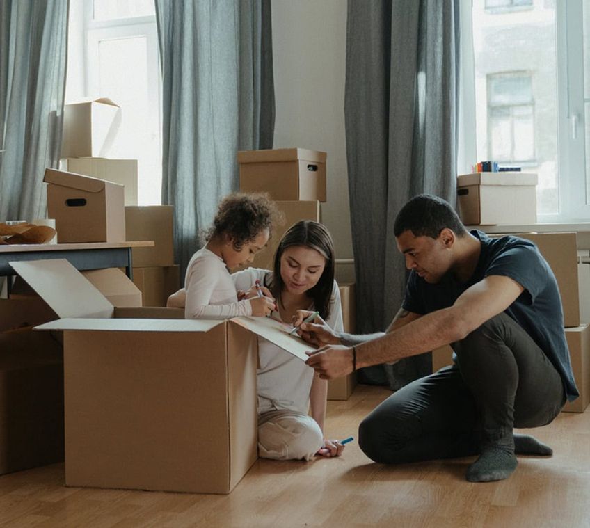 Young family moving into a new home