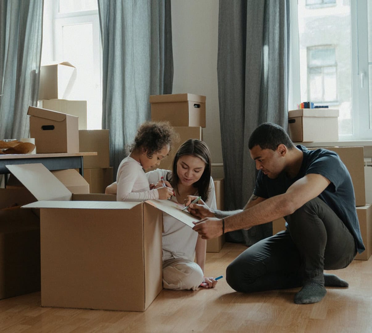 Young family moving into a new home