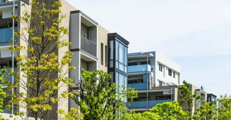 outside view of flats with leafy trees