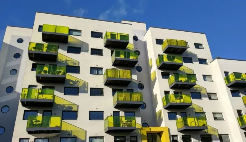 block of flats outdoor view with yellow balconies