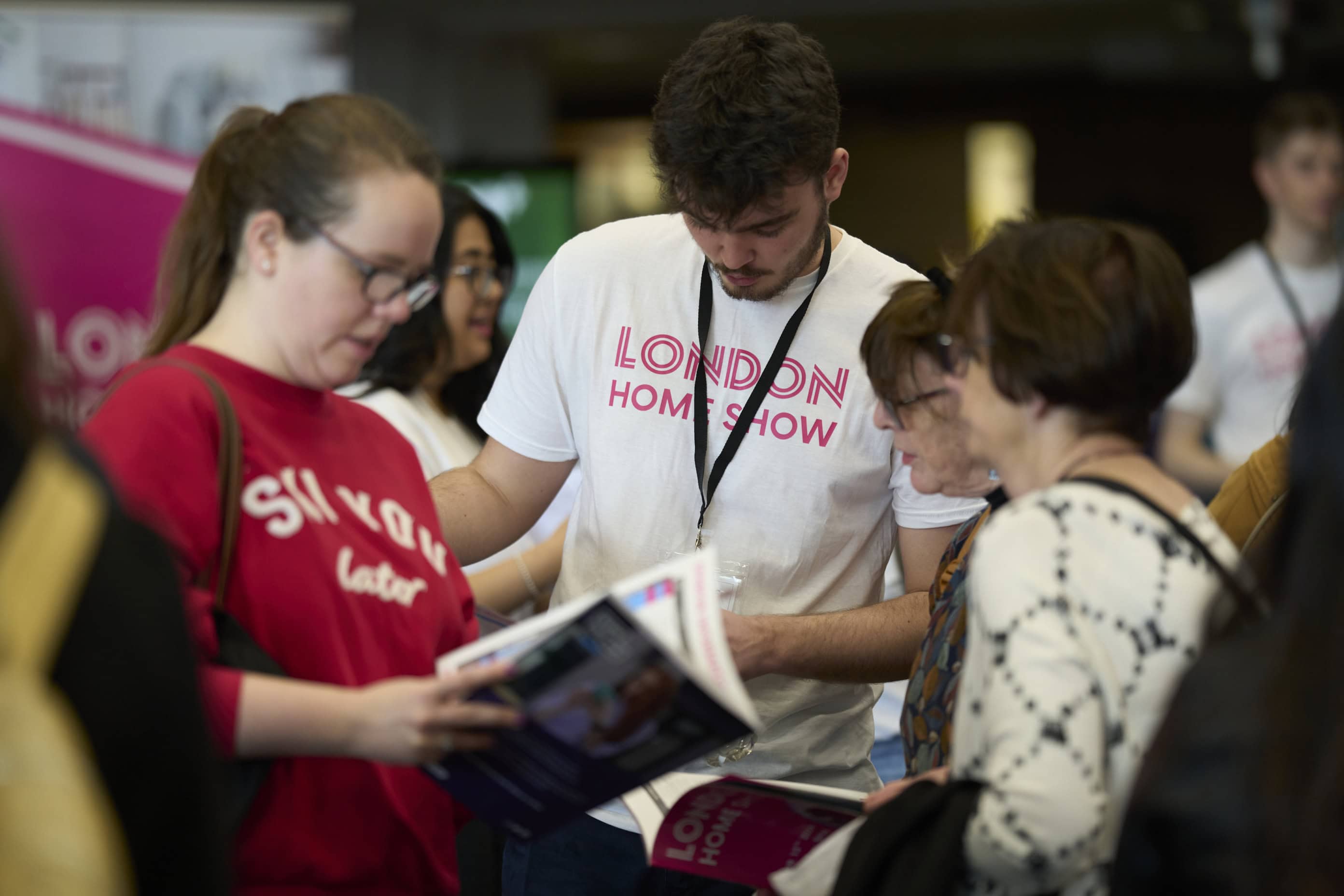 Attendees at the London Home Show in the main exhibition room