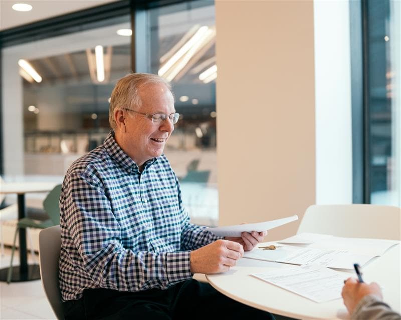 Elderly man at desk .jpg